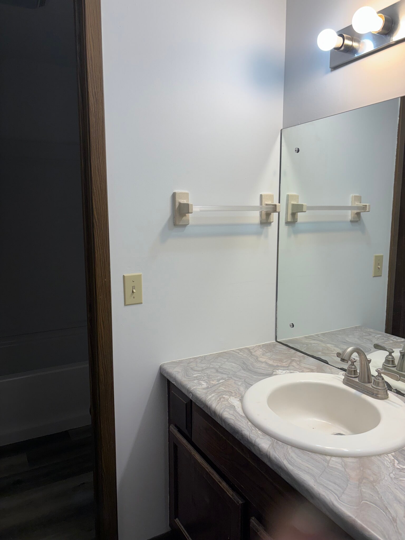 Sink outside of Shower/Stool. - 315 S Ridge Dr