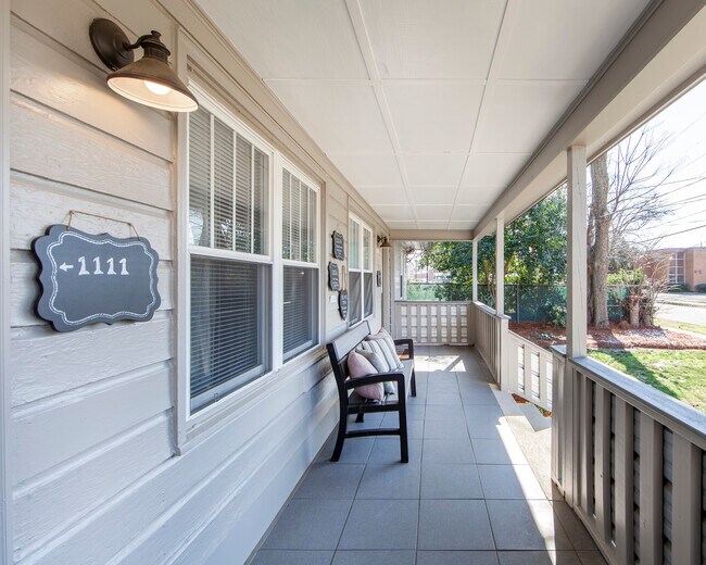 This seat could be yours! Front porch to sit and relax. - 1111 Herrin Ave