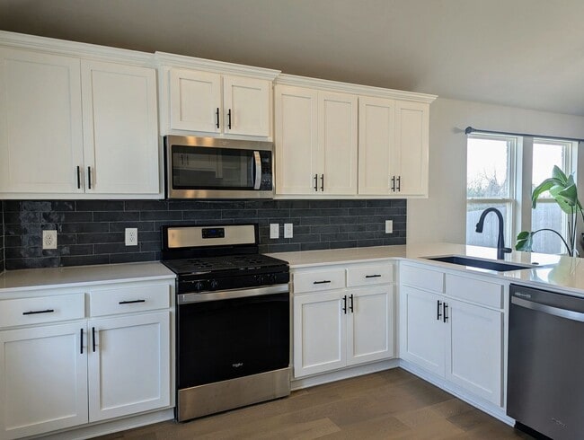 Building Photo - Spacious Yukon Home with Storm Shelter, 2-Car Garage & Fenced Yard!