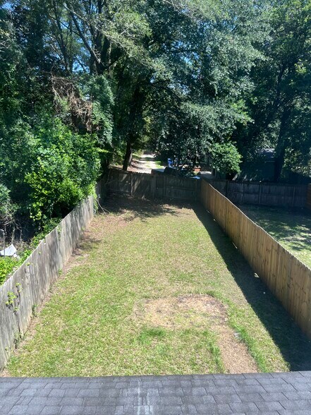Private back yard. Left side shown - 1004 Belmont Ave