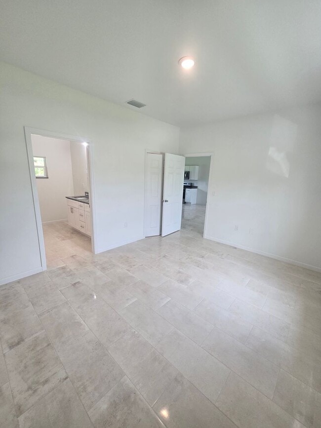 Building Photo - Brand New 3 BEDROOM 2 BATH AND ONE CAR GAR...