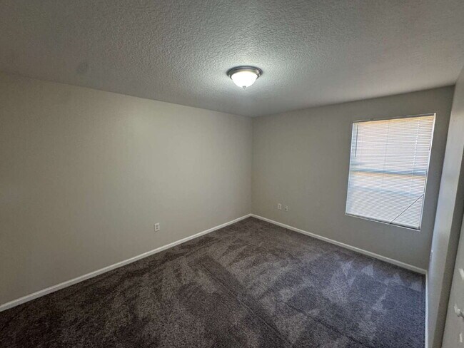 Building Photo - "Spacious 4-Bedroom Home with 2 Full Baths...