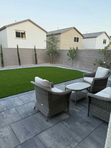 Freshly landscaped backyard with cool to touch turf - 5924 Tomsik St