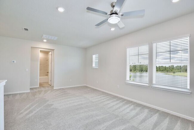 Building Photo - Modern 5/3 Water-View Home in Weslyn Park ...