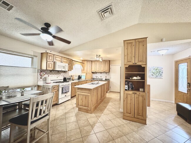 Building Photo - Fully Furnished Henderson Rental Near Cadence | 2 Bed Home w/ Solar + Backyard | Close to Cowabun...