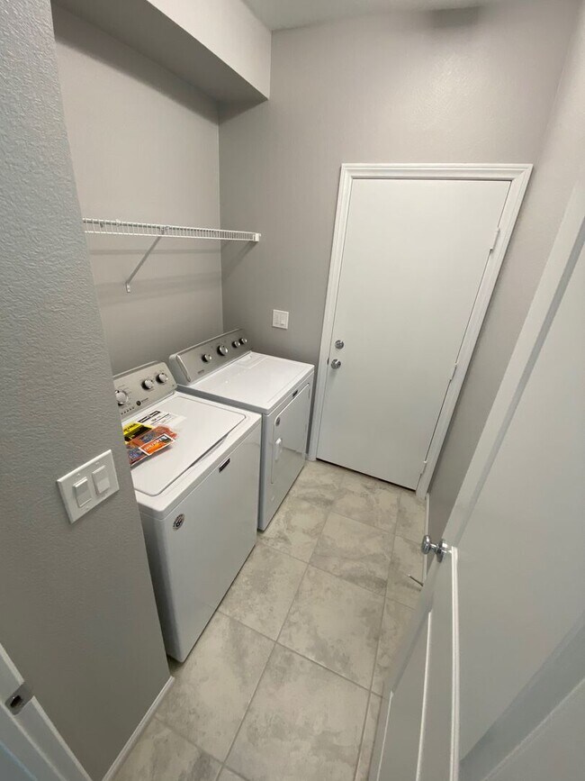 Building Photo - Modern North Las Vegas Townhome with Granite Countertops, Covered Patio & Open-Concept Living