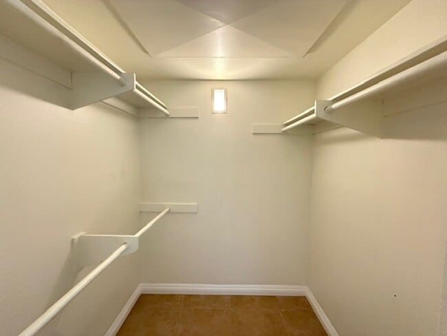 Building Photo - Resort-Style 2BR/2BA First-Floor Condo in Gated Lucera Community Near UTC