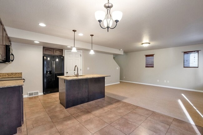 Building Photo - Pet Friendly Townhome w attached 2 car garage