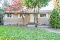 Building Photo - Charming 4-Bedroom Home with Dual Decks an...
