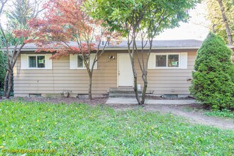 Building Photo - Charming 4-Bedroom Home with Dual Decks an...