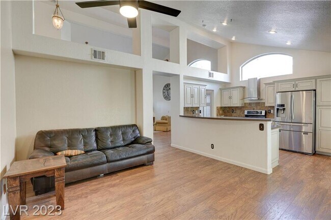 Building Photo - 4 BEDROOM HOME WITH PRIMARY BEDROOM DOWNST...