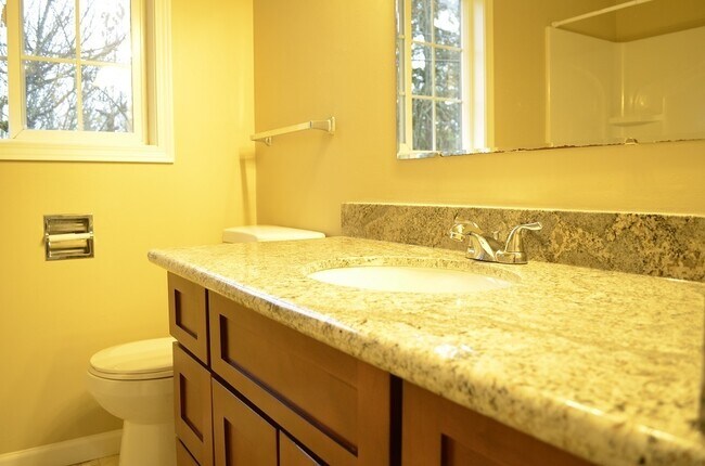 Building Photo - Updated 2-Story home with Day light basement. Big lot w/ RV & Boat parking
