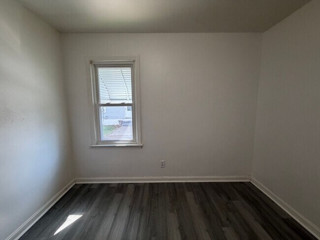 Building Photo - Bright Cape w/ Sunroom, Central Air, Big Basement & Backyard Shed