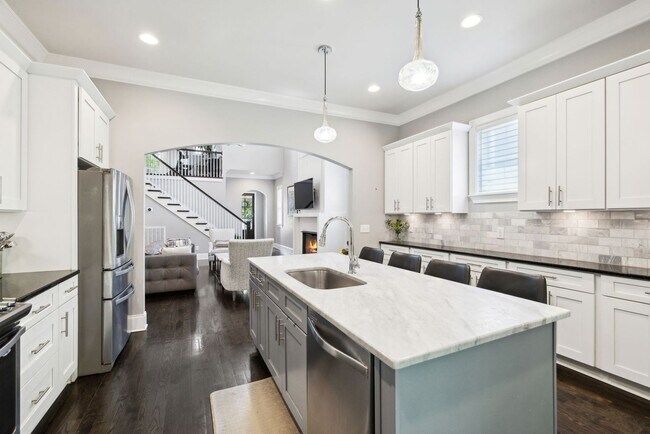 Building Photo - Welcome to this beautifully designed 4-bed...