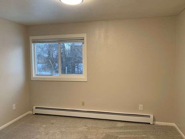 Building Photo - 2201 E 66th Ave