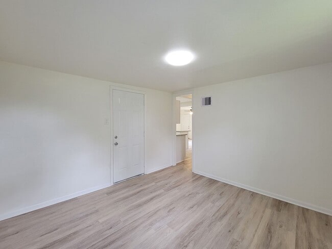 Building Photo - REMODELED 4 BEDROOM 2 BATH LEASE HOME IN A...