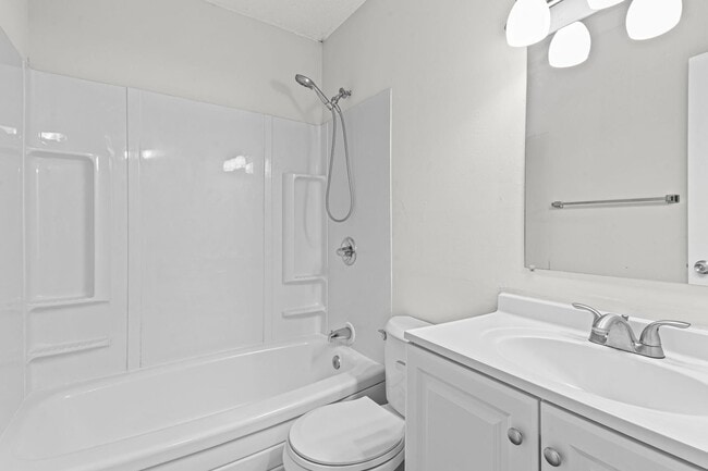 Building Photo - Summer Special! Updated 3BR Townhome with Basement + $250 Off First Month’s Rent