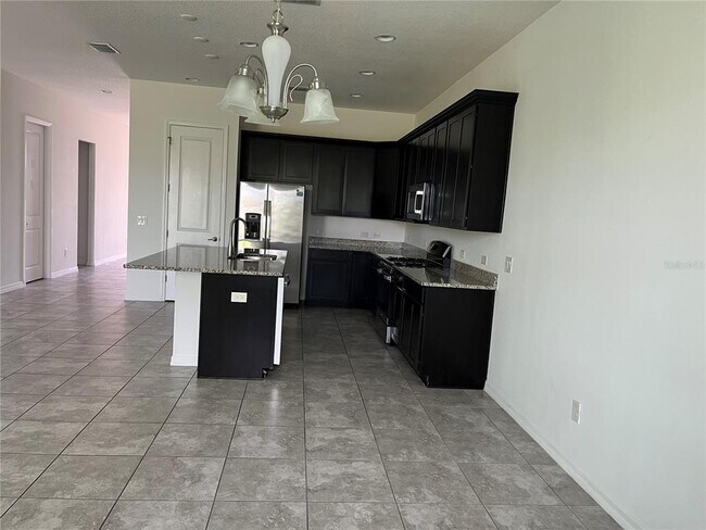 Building Photo - 9169 Carmela Ave