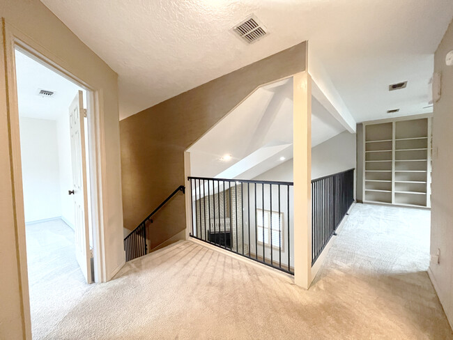 view from upstairs bedrooms to the open bonus / loft area - 2914 Broadmoor Dr