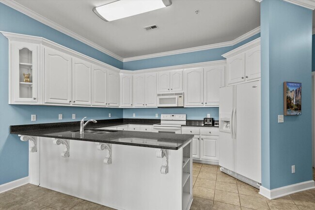 Building Photo - Riverfront Living with Spacious Layout and...