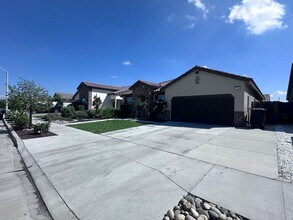 Building Photo - SE Visalia home coming soon! Equipped w/ Solar & Tesla charger