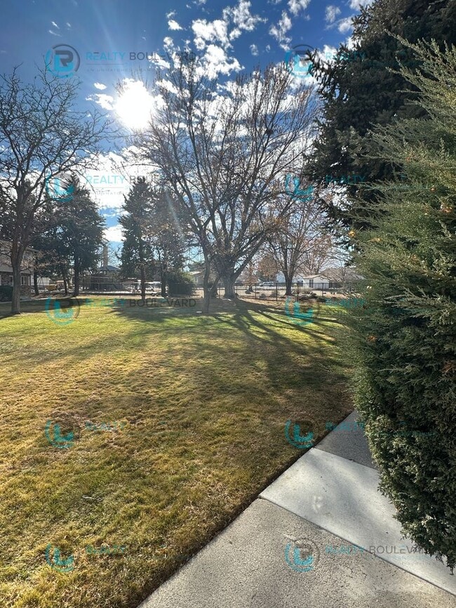 Building Photo - 2-bed, 2-bath, 2-story townhome with pool and park like setting outside the front door.