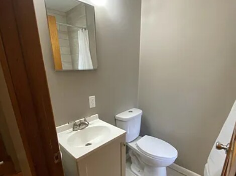 Bathroom sink and toilet. - 1028 S 24th St