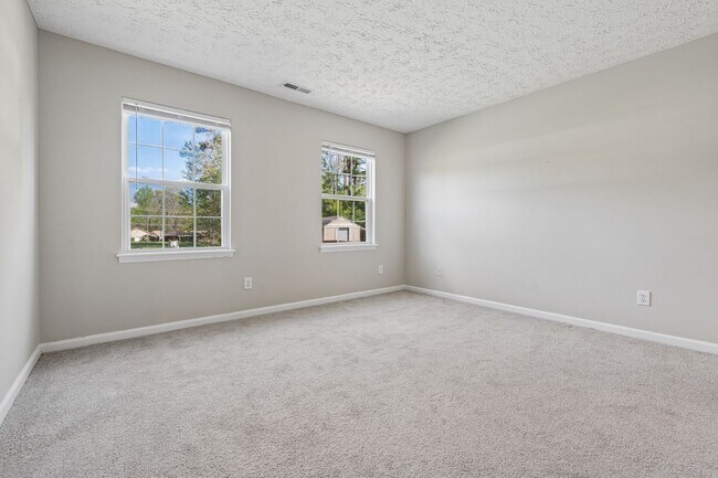 Building Photo - Welcoming 4-bed, 2.5-bath home in Durham offers thoughtful touches throughout.