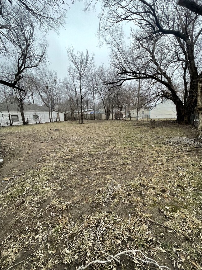 Building Photo - "Charming 3-Bed Home with Gleaming Hardwood Floors in Prime Wichita Location!"  Hurry! Limited-Ti...