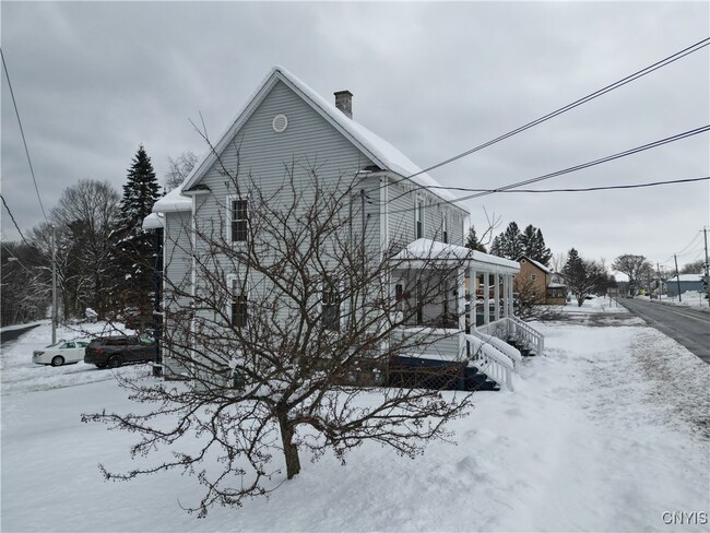 Building Photo - 102-104-104 N Helmer Ave