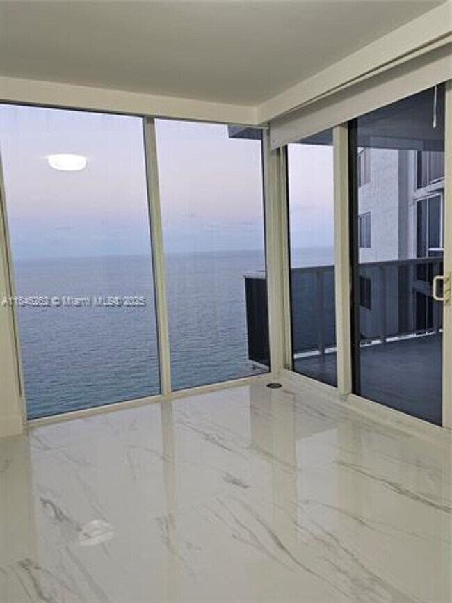 Building Photo - 19111 Collins Ave
