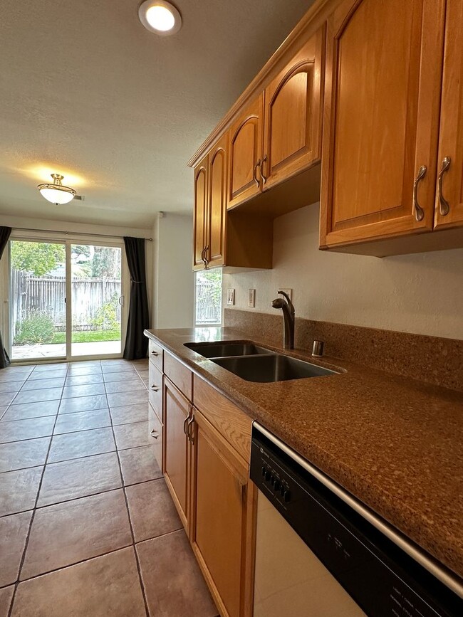 Building Photo - Single Story townhome, water/sewer paid by...