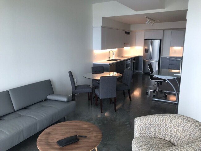 Building Photo - AVAILABLE SPRING 2027 - Downtown Iowa City High-Rise Condo with Amazing Views