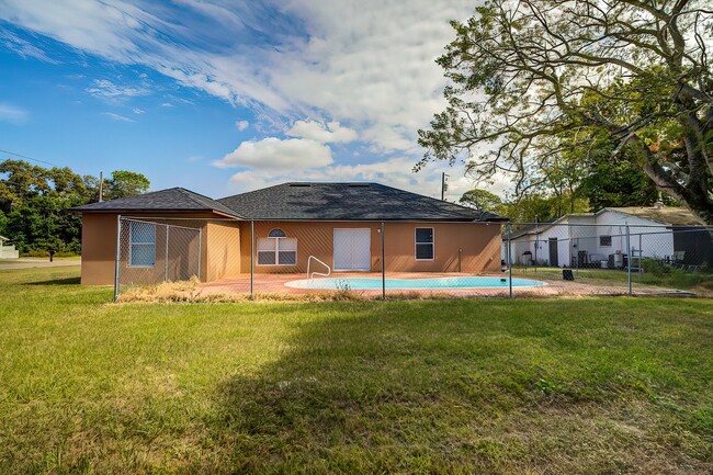 Building Photo - 4-bedroom, 2-bathroom POOL home