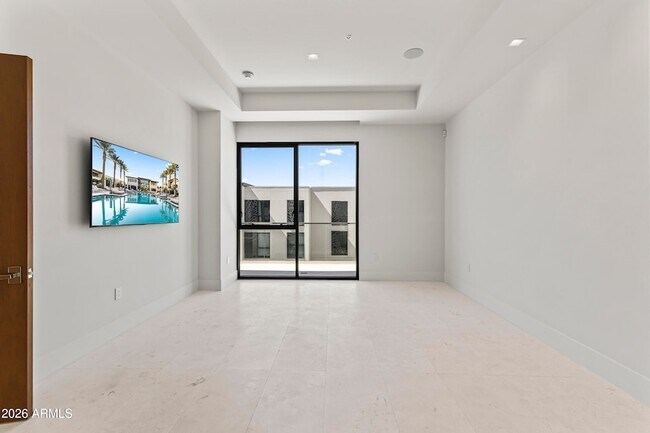 Building Photo - 6587 N Palmeraie Blvd