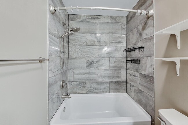 Building Photo - Spacious Updated Condo Available for Immediate Move-In