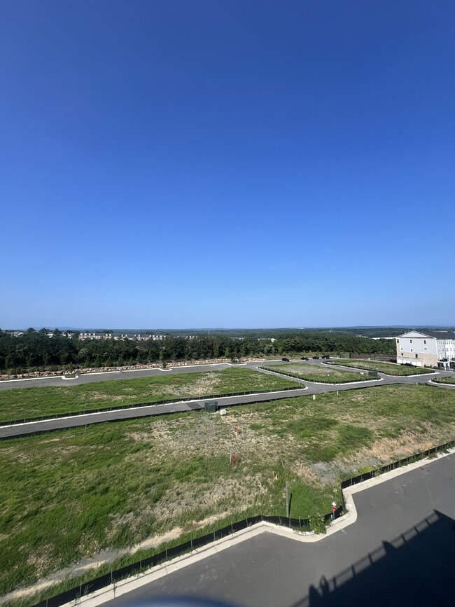 Building Photo - Brand-New Luxury 3BR Townhome-Style Condo ...