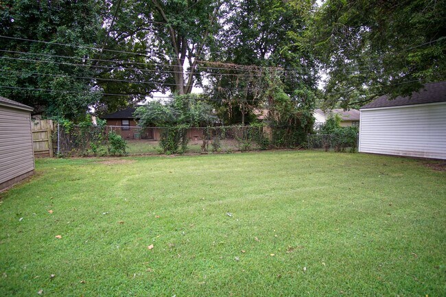 Building Photo - Gorgeous duplex unit on large lot with garage -- NO PETS ALLOWED