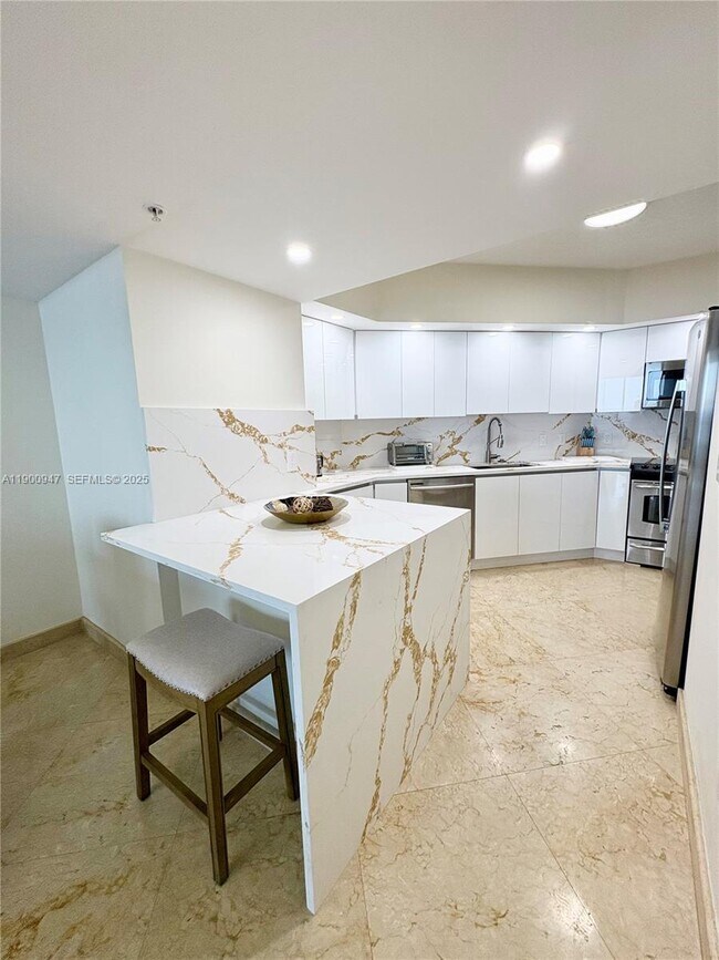 Building Photo - 16699 Collins Ave