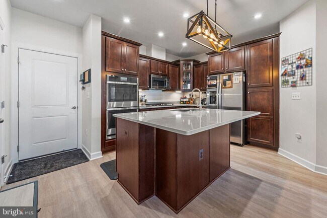 Building Photo - This beautiful 3 bed 2.5 bath 2-story condo provides a grand feeling with tall ceilings & over 16...