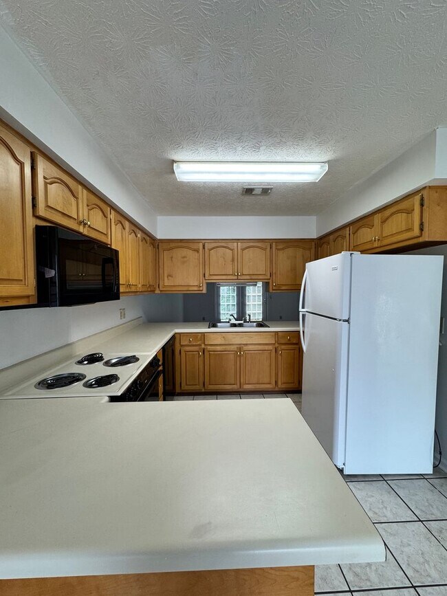 Building Photo - Available in August!