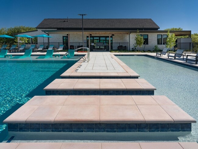 Sundeck near the sparkling pool at parcHAUS at Paloma Creek - parcHAUS at Paloma Creek