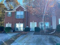 Building Photo - Welcome to this charming brick townhome in Lithonia, GA 2br/2.5 bath Townhome!