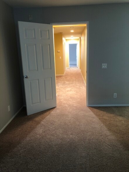Master bedroom to hallway , upstairs. - 6395 Delgado Ln