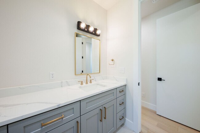 Building Photo - Luxury Redefined: Experience Vibrant Living in this 3-Bedroom Haven in East Austin