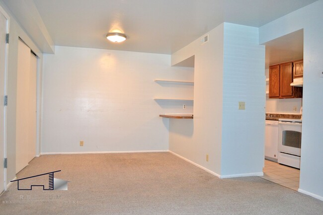 Building Photo - Lower-Level Roy 2 Bedroom, 1 Bathroom Condo Available!