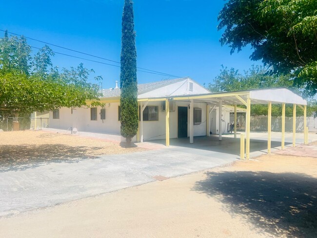 Primary Photo - Charming 3-Bedroom Home with Wood Ceilings...