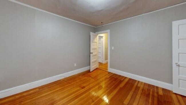 Building Photo - Renovated 6BR with In-Unit Laundry, 3 Parking Spaces & Commuter Rail Access