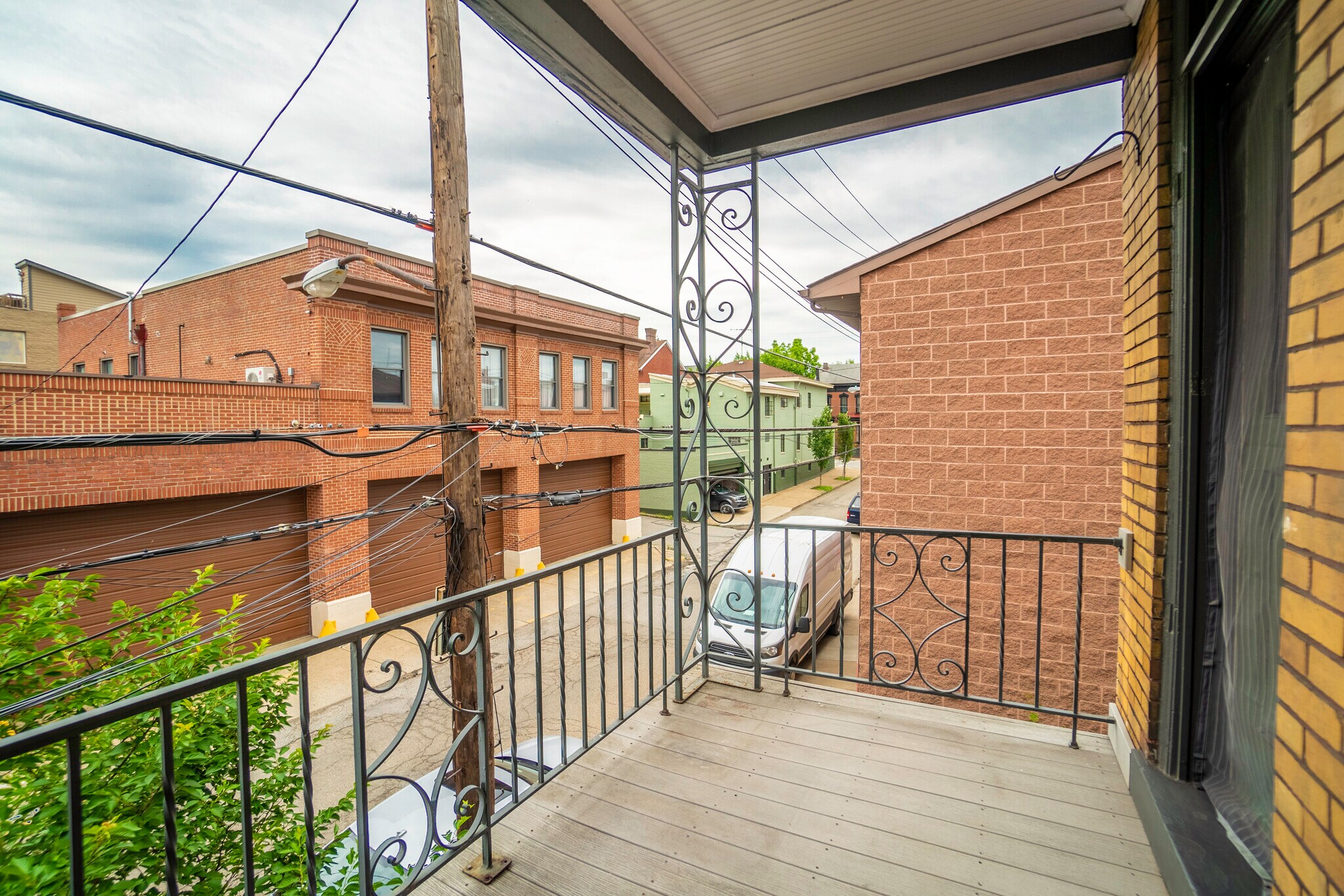 Side balcony from kitchen overlooks garden - 4121 Davison St