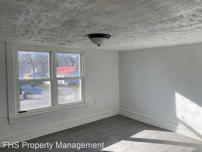 Building Photo - 4 br, 2 bath House - 1721 W Thoman